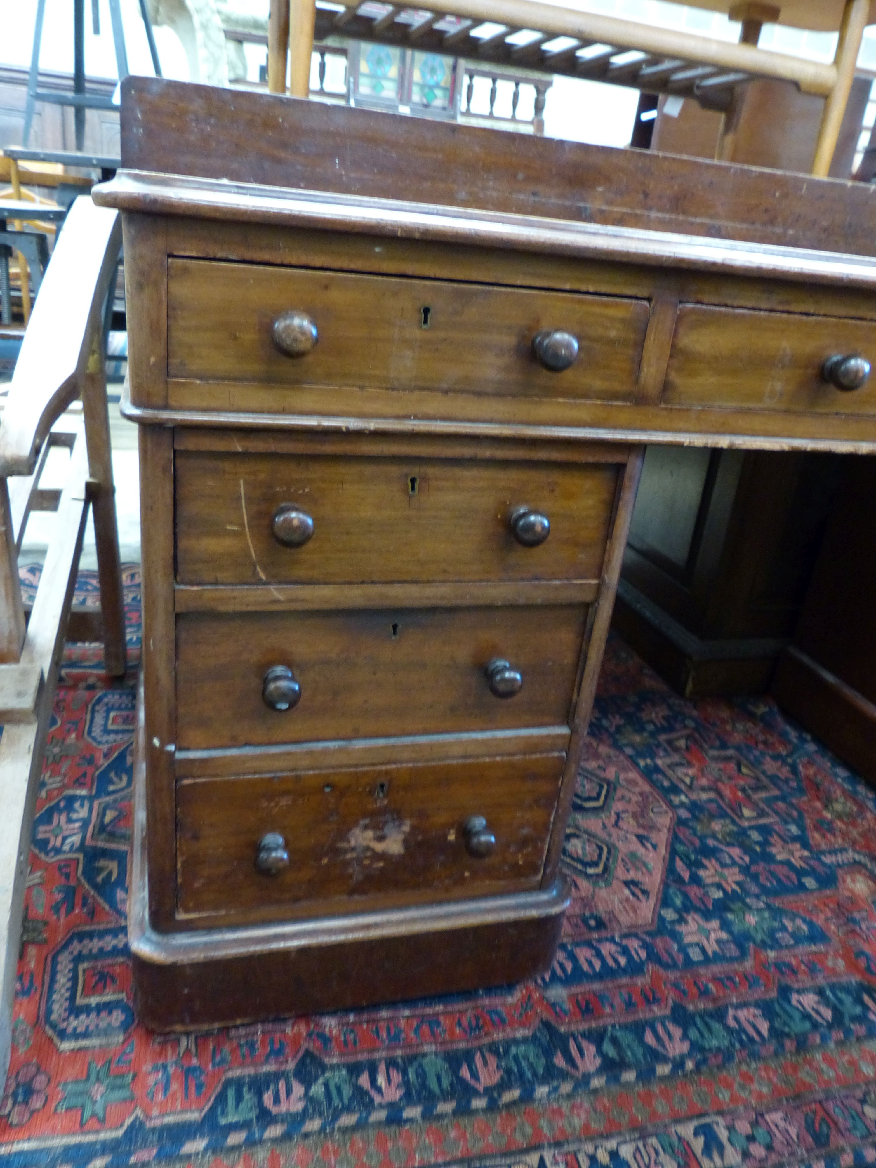 A late Victorian mahogany pedestal desk, length 152cm